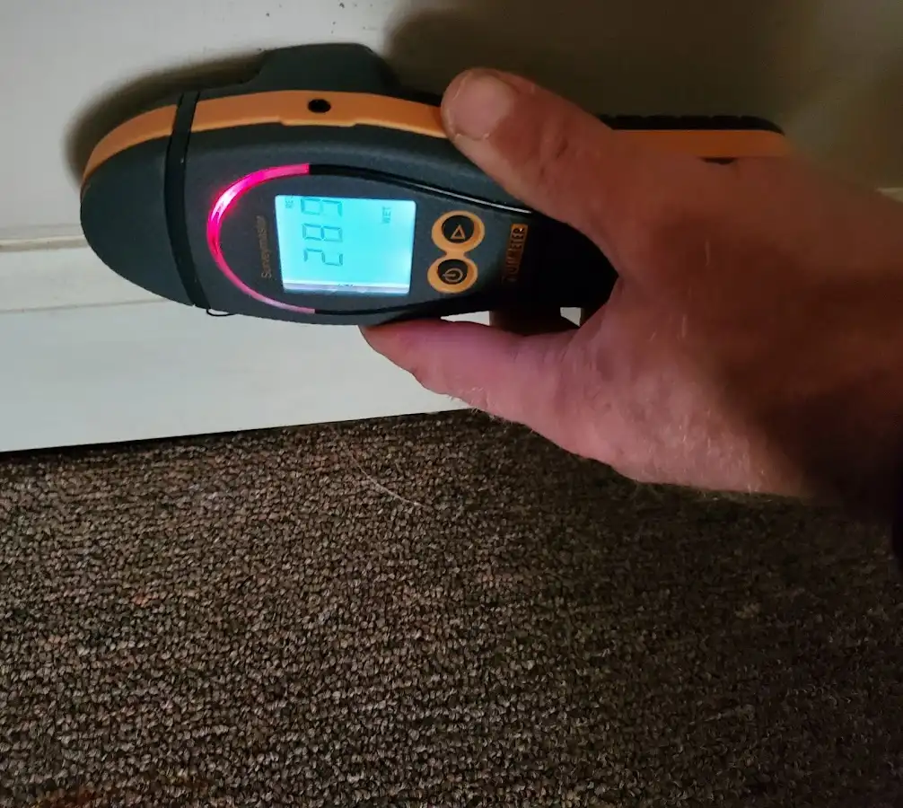 Moisture detection at baseboard during Sewage Cleanup & Sanitation in Norcross